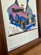 Load image into Gallery viewer, The mirror features vivid tones and a glamorous art deco lady, complemented by bold branding fonts. A vintage classic car in pink and blue colours has a centrepiece.
