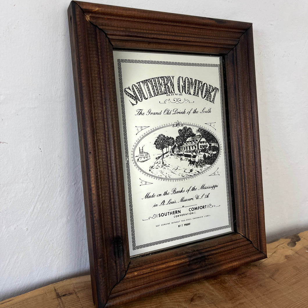 showcasing the iconic picture of the Mississippi in stunning detail, as well as the bold logo and calligraphy wording information. The wooden frame is mid to dark in colour and nice vintage condition
