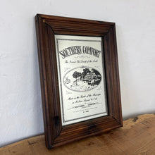 Load image into Gallery viewer, showcasing the iconic picture of the Mississippi in stunning detail, as well as the bold logo and calligraphy wording information. The wooden frame is mid to dark in colour and nice vintage condition
