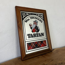 Load image into Gallery viewer, Stunning brewery mirror featuring the famous logo towards the centre and stand-out fonts of the well-known brewery Wm Youngers advertising the tartan ale with a vibrant picture of a piece of tartan in and an intricate Victorian style border.
