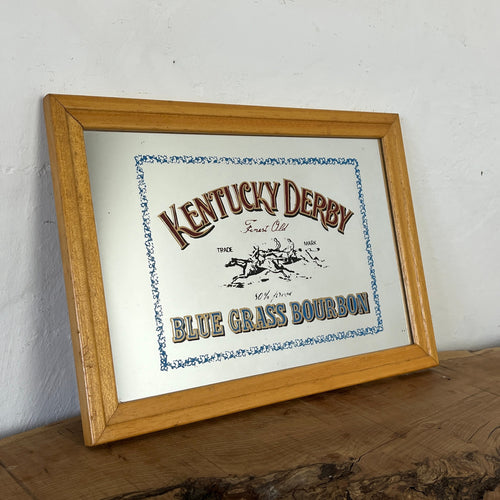 features a horse racing design. The branding is depicted in bold, vivid fonts in red and blue, and there is an intricate picture of a horse race along with a blue floral border.