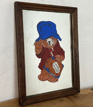 Load image into Gallery viewer, Fantastic Paddington design with bold wording towards the top with a superb picture of the bear with his iconic suitcase, raincoat and hat with nice aged matt colours with wanted on voyage written on his suitcase

