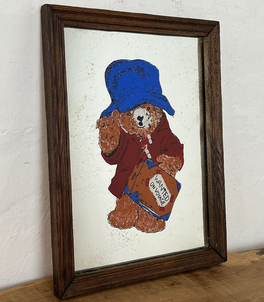 Fantastic Paddington design with bold wording towards the top with a superb picture of the bear with his iconic suitcase, raincoat and hat with nice aged matt colours with wanted on voyage written on his suitcase