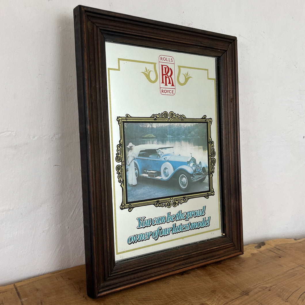 glamourous design with antique picture of the luxury car in intricate finish, excellent quote in stylish fonts with a detailed gold border and red logo of the brand.