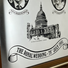 Load image into Gallery viewer, Vibrant mirror featuring the wedding of Charles and Diana on the 29th of July 1981 with a portrait of the couple and intricate picture of St Pauls and the fonts in a banner design.
