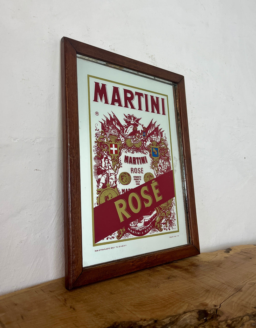Wonderful art deco Martini rose vintage mirror with vibrant intricate pattern and detail with stand out logo on the famous branding the famous emblem advertising the rose version on the alcohol drink.