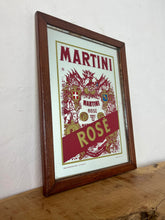 Load image into Gallery viewer, Wonderful art deco Martini rose vintage mirror with vibrant intricate pattern and detail with stand out logo on the famous branding the famous emblem advertising the rose version on the alcohol drink.
