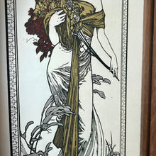 Load image into Gallery viewer, Beautiful Mucha collectables piece features an elegant lady with a stylish dress in an matt gold finish flowing down with a vivid robe holding a large bouquet with a beautiful floral background and the vibrant, intricate border.
