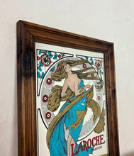 Load image into Gallery viewer, Stunning art nouveau mirror featuring a glamorous lady wearing an elegant dress and scarf with an azure blue design with her hair flowing across the mirror in the background continues with the flower design with an intricate pattern.
