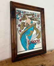 Load image into Gallery viewer, Stunning art nouveau mirror featuring a glamorous lady wearing an elegant dress and scarf with an azure blue design with her hair flowing across the mirror in the background continues with the flower design with an intricate pattern.
