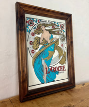 Load image into Gallery viewer, Stunning art nouveau mirror featuring a glamorous lady wearing an elegant dress and scarf with an azure blue design with her hair flowing across the mirror in the background continues with the flower design with an intricate pattern.
