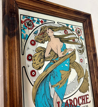 Load image into Gallery viewer, Stunning art nouveau mirror featuring a glamorous lady wearing an elegant dress and scarf with an azure blue design with her hair flowing across the mirror in the background continues with the flower design with an intricate pattern.
